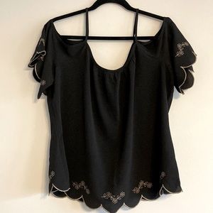 Black peasant top with tank top straps and off the shoulder cuffs